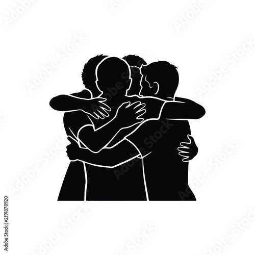 Silhouette of a group of friends embracing in a circle huddle