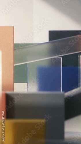 Vertical video: Pushing camera in, revealing studio table with glass panels and ramp for highlights