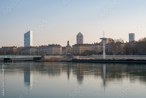 Принти на полотні Lyon cityscape with modern skyscrapers and historic buildings reflected in the S