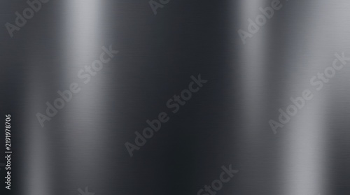 Brushed metal texture background with dark grey gradients and horizontal lines
