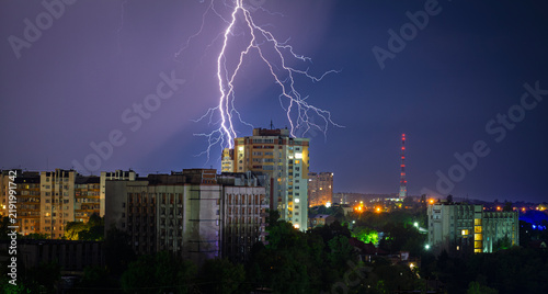 Lightning and a stormy sky over the city at night