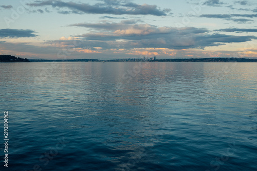 фотографія distant view of Seattle from ferry boat, puget sound