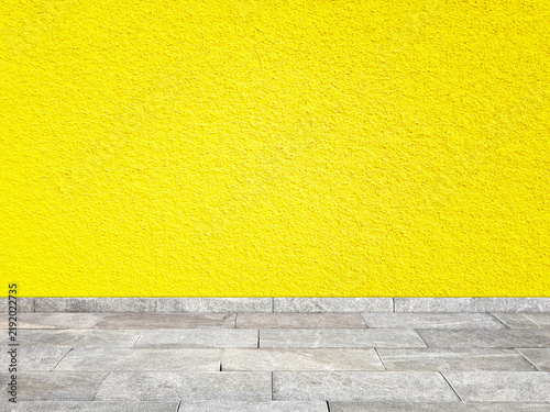 Empty room with yellow wall and floor