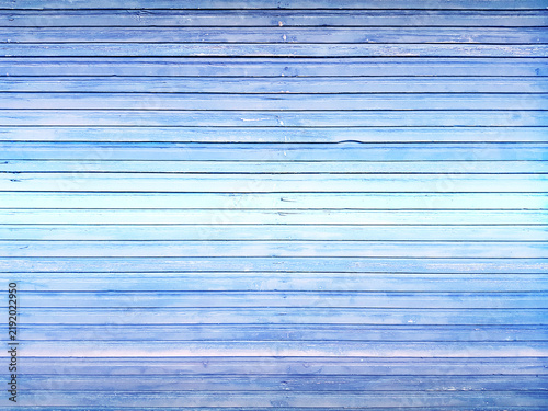 Top view of blue background wooden planks board texture.