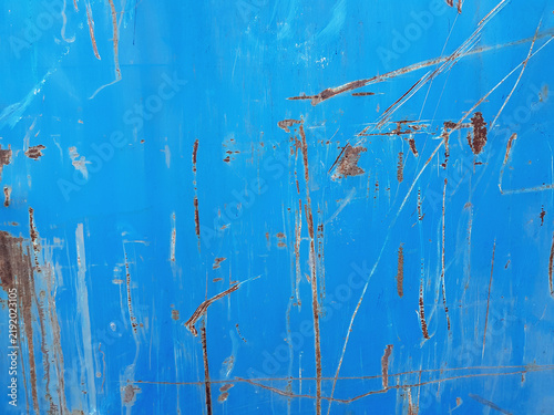Rusty metal surface texture. Sheet with rust and worn paint blue background
