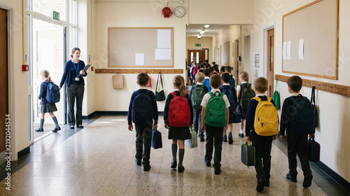Morning School Corridor Arrival: Primary Students Walking In