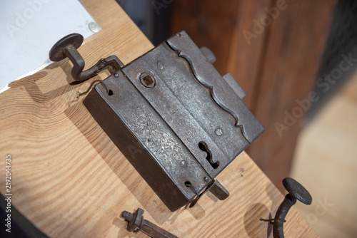 Detail of an old metal door lock.