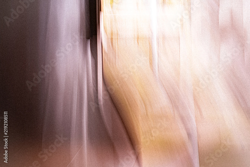Fotografie Ethereal golden waves captured with intentional camera movement