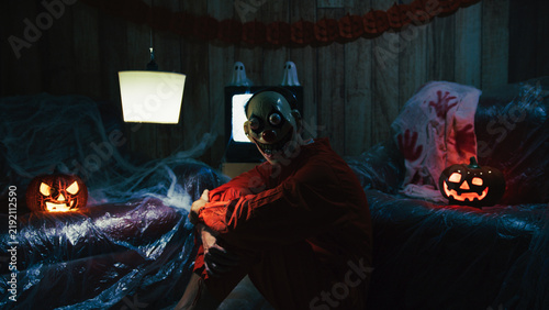 Konstfotografi Halloween Party Room With Costumed Clown and Pumpkins