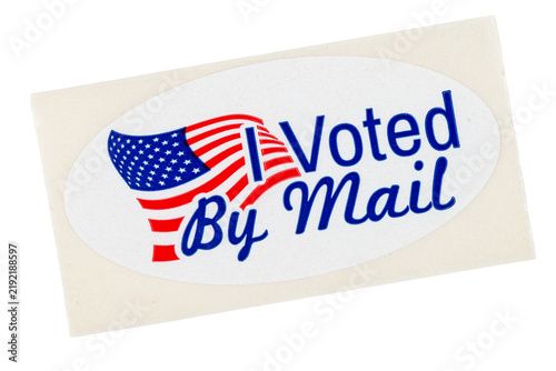 I voted by mail over an American flag sticker