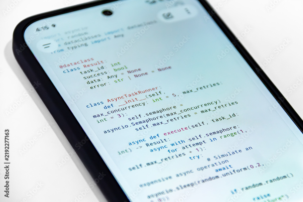 Obraz premium Close-Up Smartphone Displaying Python Async Programming Code on a Clean White Background