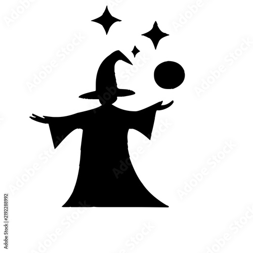 Foto Magician performing sleight of hand trick with floating ball in black silhouette