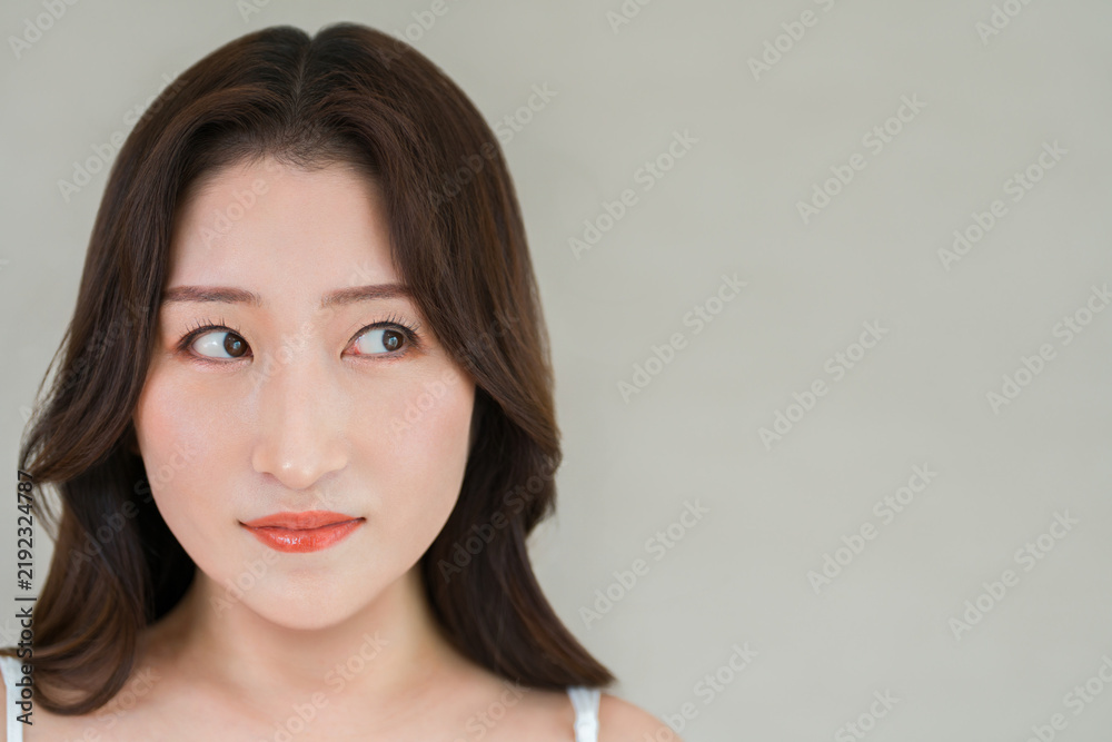 Fototapeta premium Middle-Aged Woman with Clear Beautiful Skin and Copy Space, Beauty and Skincare Advertising Concept