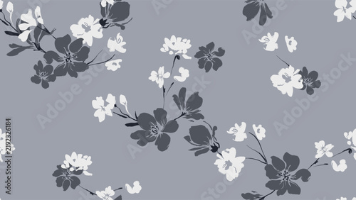 Floral seamless pattern features blue magnolia and white wildflowers silhouettes on a muted slate-blue background. The flowers have a painterly, slightly abstract quality