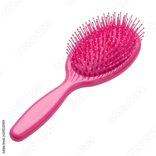 Pink hair brush isolated on white background for hair styling and grooming