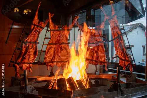Obraz na plátně Patagonian lamb, ember-roasted in the traditional Argentine style