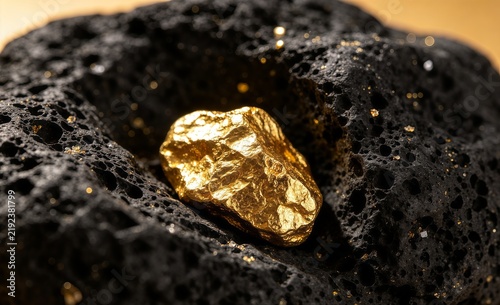 Raw gold nugget nestled in dark volcanic rock, highlighting natural resources, mineral wealth, and mining potential.