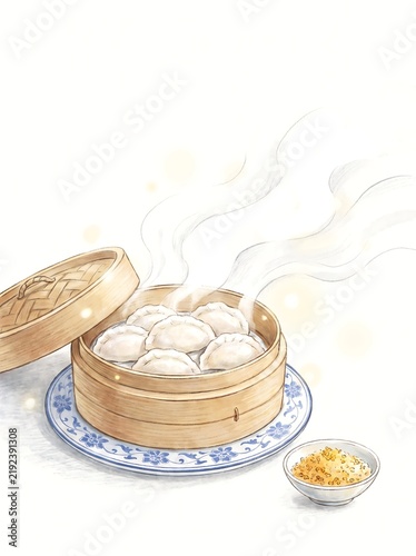 Steaming dumplings in a bamboo steamer with dipping sauce and blue plate