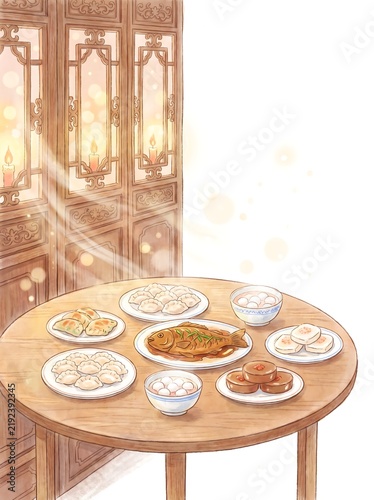 Warm dinner spread of fish and dumplings beside a glowing lantern
