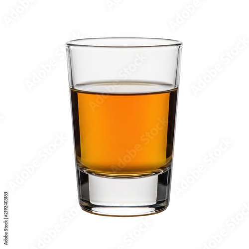 Small glass of amber whiskey or alcohol spirit isolated on transparent background