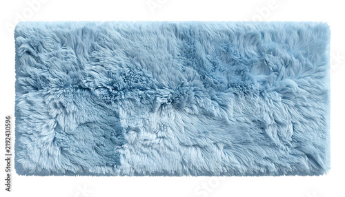 Rectangular, fluffy, pale blue sheepskin rug with rounded corners, texture visible