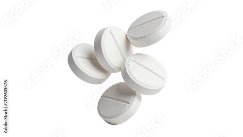 Quadro su tela Five white round pills with score lines, isolated on transparent background