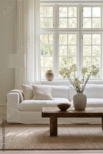 Warm minimalist living room with neutral furniture