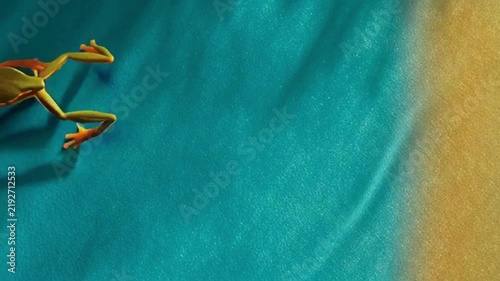authentic human lifestyle concept Vibrant Green Tree Frog on a Colorful Turquoise and Orange Textured Background with Copy Space modern commercial stock usage