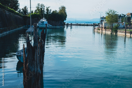 Glimpse of Peschiera del Garda, Italy, overlooking the Mincio, a river in northern Italy, the only emissary of Lake Garda and the last left tributary of the Po
