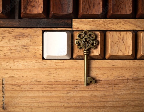 Classic vintage key isolated on an elegant background, symbolizing security, access, mystery, heritage, and timeless craftsmanship.