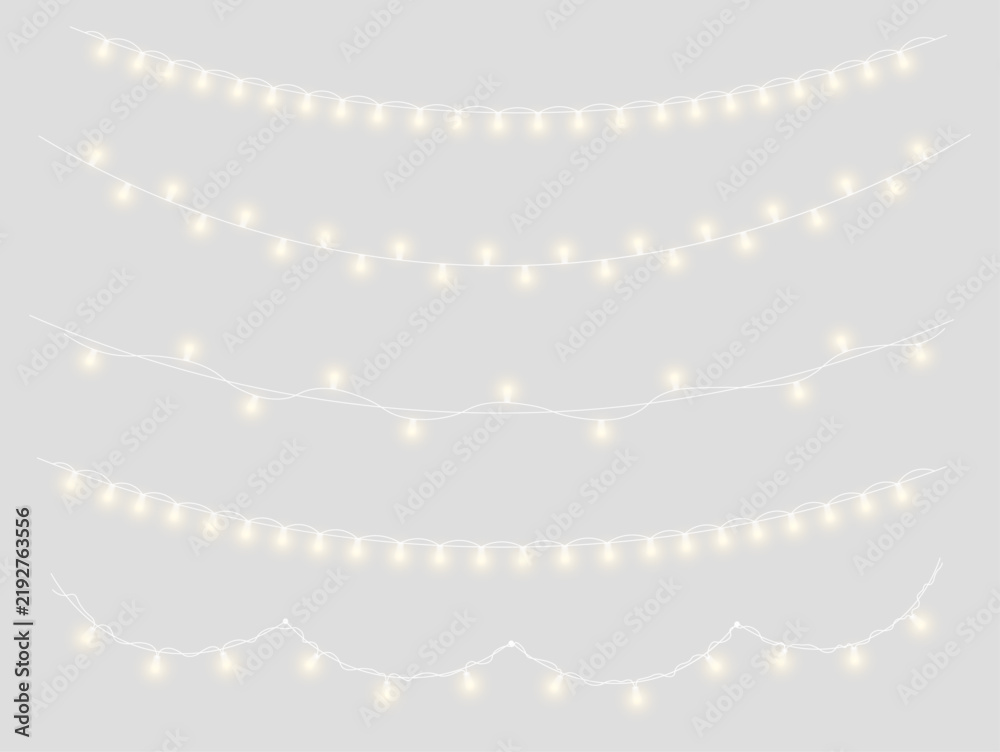 Obraz premium Warm Christmas garland featuring bright golden bulbs and tiny sparks. Curved strings create beautiful decorative borders. Transparent PNG set for seasonal artwork.