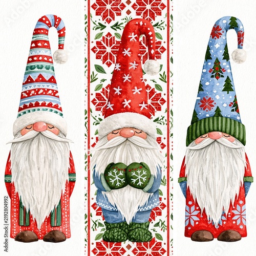 Christmas gnome trio with red hats, winter greenery and poinsettia flowers