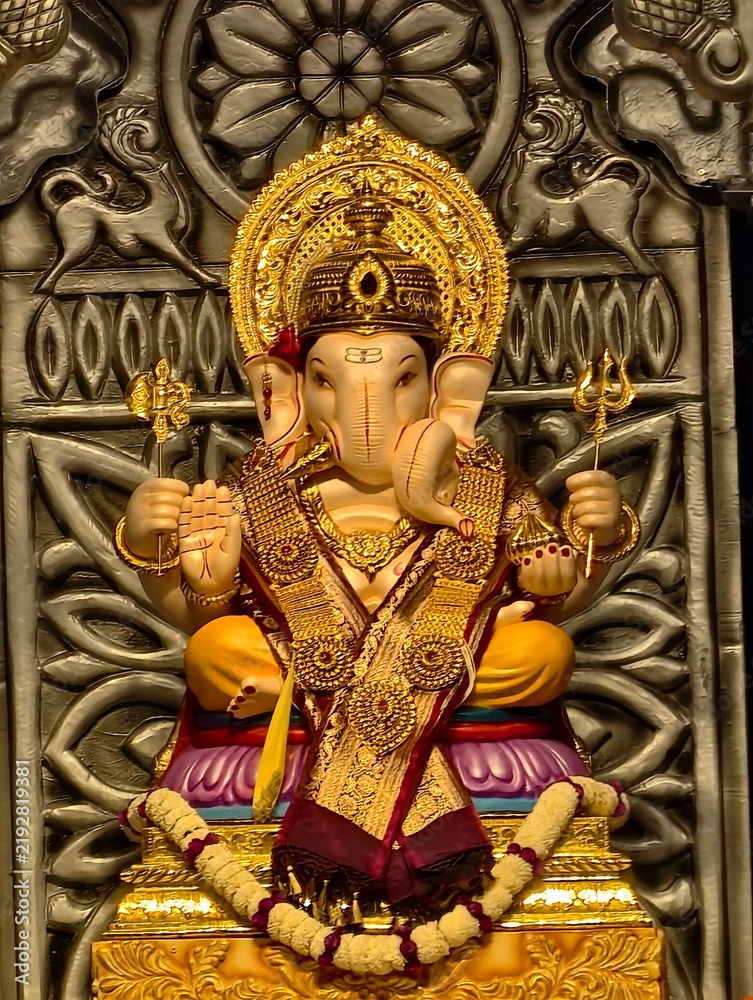 Fototapeta premium 14 September 2026, Pune, Maharashtra, India, Beautiful sculpture of Lord Ganesh called as Tambdi Jogeshwari Ganpati near ABC chowk, Pune, during Ganesh Utsav Festival 2026.