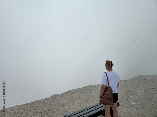 Obraz na płótnie Traveler Standing in Dense Fog on Zugspitze Summit