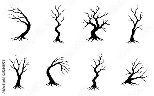 Eight Black Leafless Tree Silhouettes with Twisted Trunks, Bare Branches and Spreading Roots