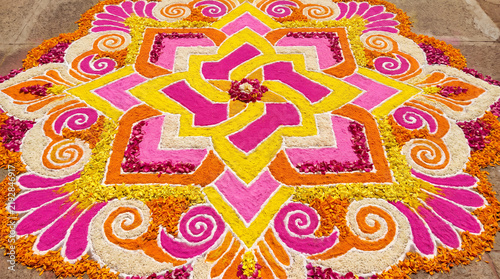 Floral Mandala of Vibrancy: A breathtaking floral mandala, meticulously crafted with vibrant petals and aromatic blossoms, forms a sacred geometric pattern.