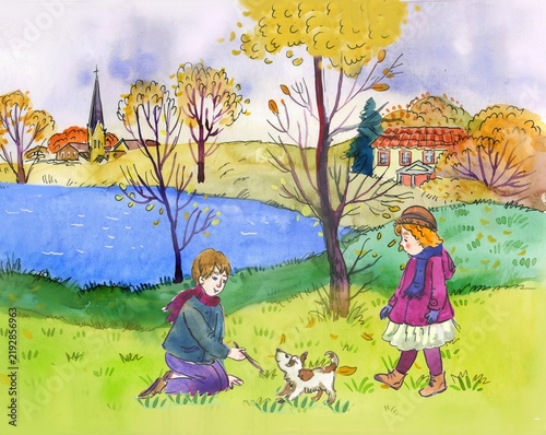 little girl and boy  and dog playing in autumn park