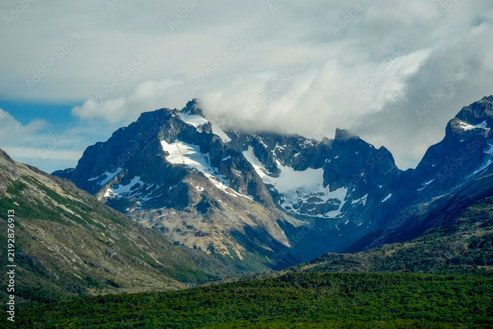 Fototapeta premium Snow-Capped Patagonian Mountain Peaks Above Ushuaia Valley