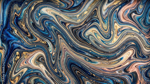 Abstract liquid marble swirl background with blue and gold metallic paint textures