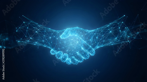 Close-up of two hands shaking with digital wireframe overlay in dark background