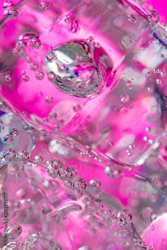 Картината върху платно Refreshing pink drink with sparkling bubbles and ice
