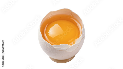 Konstfotografi Cracked white eggshell with bright yellow yolk, isolated on transparent backgrou