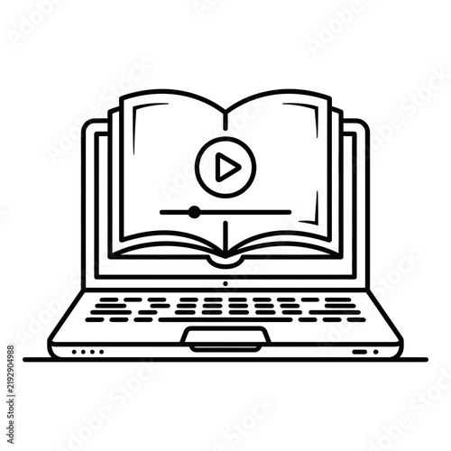 Laptop computer with open book on screen