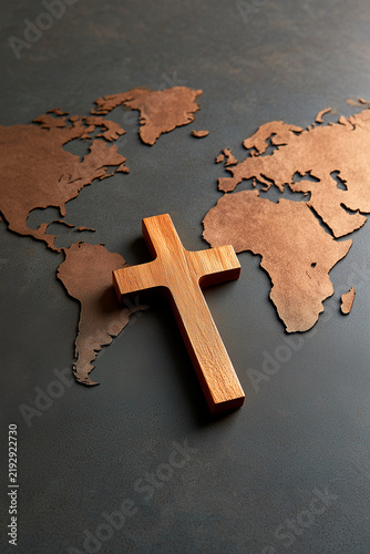 Holy cross of Jesus Christ and world map. Global mission and evangelism concept. Telling all the people about Jesus. Spreading the evangelism around all nations