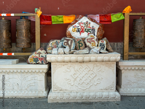 Obraz na płótnie Tibetan Prayer Wheels and Mani Stones at Dazhao Temple, Hohhot, Inner Mongolia