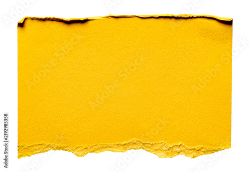 Isolated cut out piece of torn ripped yellow paper with creases and copy space for text, design element background