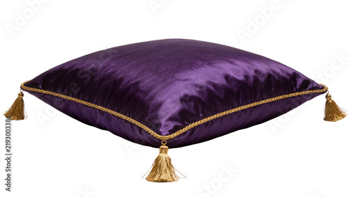 Plush purple velvet cushion with gold trim and tassels, isolated on transparent background
