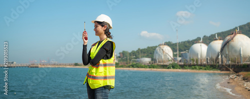 Woman engineer working and inspection gas pipeline system new construction project of industrial.