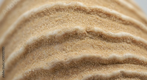 Close-up of Sand Texture with Natural Waves Pattern, Macro Photography, Desert Environment, Detailed Surface View, Organic Concept