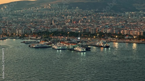 Aerial View of Bostanli Ferry Terminal and Moored Ferries at Dusk Sunset in Izmir Turkey